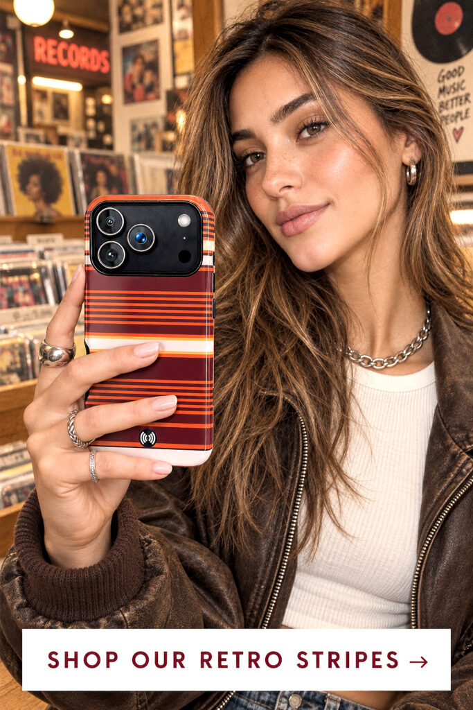 Woman holding a retro striped phone case